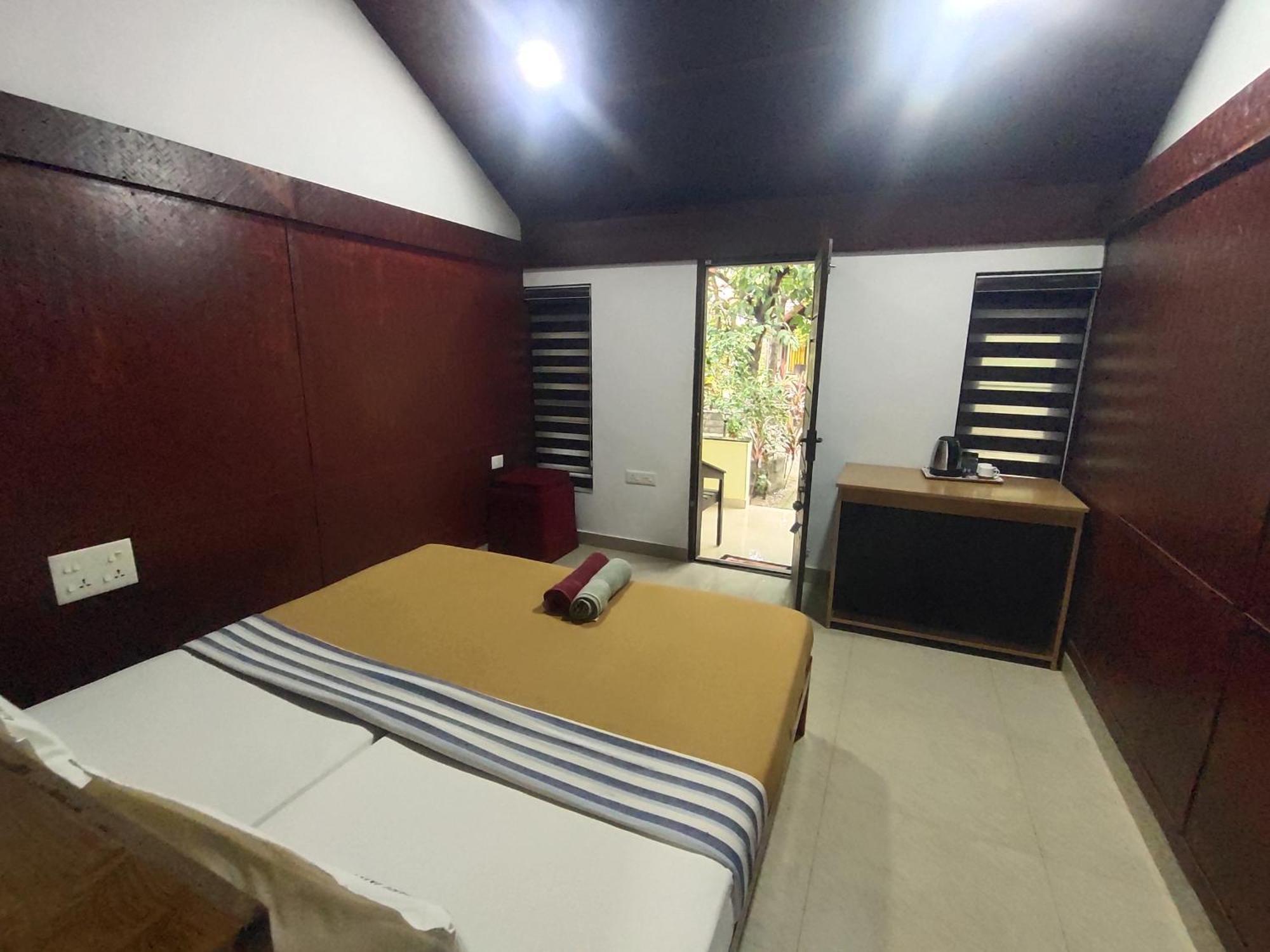 Savithri Inn Cottage Varkala Værelse billede
